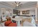 Spacious living room seamlessly connected to a modern kitchen, featuring stylish furniture and plenty of natural light at 1753 N Berrett --, Mesa, AZ 85207