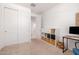 Adaptable room with built in storage, closet and door to an adjacent room at 17864 W Fetlock Trl, Surprise, AZ 85387