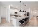 Beautiful kitchen featuring granite countertops, stainless appliances, and a large island at 17864 W Fetlock Trl, Surprise, AZ 85387