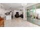 Open-concept living space featuring a modern chandelier, living room and gourmet kitchen at 17864 W Fetlock Trl, Surprise, AZ 85387
