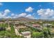 Panoramic aerial shot featuring homes with spacious lots, green landscaping, and mountain scenery at 18132 E Vencino St, Gilbert, AZ 85298