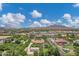Expansive aerial view showcases the well-maintained property, including the lush landscaping and functional outbuildings at 18132 E Vencino St, Gilbert, AZ 85298