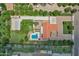 Expansive aerial view showcasing the entire property, including the pool, home, and yard at 18132 E Vencino St, Gilbert, AZ 85298