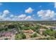 Sprawling aerial view of the community showcasing well-manicured lawns and tree-lined streets at 18132 E Vencino St, Gilbert, AZ 85298