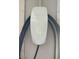 A mounted Tesla charger, designed for convenient home charging solutions at 18132 E Vencino St, Gilbert, AZ 85298