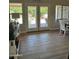 Bright dining area with natural light shining through the french doors to the backyard at 18132 E Vencino St, Gilbert, AZ 85298