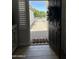Inviting entryway with black door and welcome mat at 18132 E Vencino St, Gilbert, AZ 85298