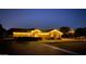 Beautiful single-Gathering home illuminated at twilight, boasting great curb appeal with tasteful holiday lighting at 18132 E Vencino St, Gilbert, AZ 85298