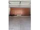 A spacious garage featuring ample cabinet storage along the wall and a clean epoxy floor at 18132 E Vencino St, Gilbert, AZ 85298