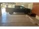 Spacious garage featuring a black pickup truck and ample storage space at 18132 E Vencino St, Gilbert, AZ 85298