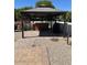 Shaded gazebo with a hot tub and lounge chairs provides a relaxing outdoor escape in the backyard at 18132 E Vencino St, Gilbert, AZ 85298