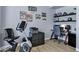 Office with desk, computer, chair, and exercise equipment at 18132 E Vencino St, Gilbert, AZ 85298