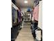 Spacious walk-in closet features lots of hanging and shelf space for storage at 18132 E Vencino St, Gilbert, AZ 85298