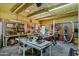 Workshop with work benches, various power tools and insulated ceiling at 18132 E Vencino St, Gilbert, AZ 85298