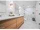 Bathroom featuring a modern vanity, glass shower, and stylish fixtures and decor at 1831 W Seldon Ln, Phoenix, AZ 85021