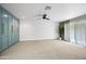 Spacious bedroom with custom built-in closet and large windows with lots of light at 1831 W Seldon Ln, Phoenix, AZ 85021
