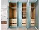Custom built-in closet with drawers and shelving provides ample storage space at 1831 W Seldon Ln, Phoenix, AZ 85021