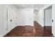 Spacious foyer featuring hardwood floors, recessed lighting, and multiple doors and entryways at 1831 W Seldon Ln, Phoenix, AZ 85021