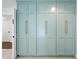 A custom storage cabinet is featured in this room with a doorway leading to another room at 1831 W Seldon Ln, Phoenix, AZ 85021