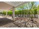 Serene backyard with a covered patio and meticulous landscaping at 19 E Boca Raton Rd, Phoenix, AZ 85022