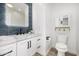 Beautiful bathroom with stylish vanity, modern fixtures, and ample storage space at 19 E Boca Raton Rd, Phoenix, AZ 85022