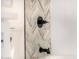 Close up of tub faucet and stylish herringbone tile surround at 19 E Boca Raton Rd, Phoenix, AZ 85022