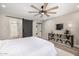 Large bedroom offering wood floors, a ceiling fan, and ample natural light at 19 E Boca Raton Rd, Phoenix, AZ 85022