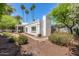 Charming home exterior with manicured landscaping, lush greenery, and inviting curb appeal at 19 E Boca Raton Rd, Phoenix, AZ 85022