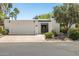 Charming single-story home featuring a two-car garage, secure gated front entry, and xeriscaped yard at 19 E Boca Raton Rd, Phoenix, AZ 85022