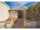 Charming front entry with decorative arch and desert landscaping at 1908 E Beck Ln, Phoenix, AZ 85022