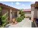 Inviting front entrance with desert landscaping, walkway, and charming architectural details at 20007 N Siesta Rock Dr, Surprise, AZ 85374