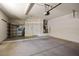 Spacious garage with ample storage, shelving, and a clean, functional layout at 20007 N Siesta Rock Dr, Surprise, AZ 85374