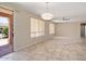 An open concept living space with backyard access and neutral tones at 20007 N Siesta Rock Dr, Surprise, AZ 85374