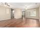 Spacious open-concept living area with hardwood floors and ample natural light at 20223 N Sundance Way, Surprise, AZ 85374