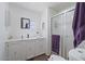 Bathroom with a single sink vanity, lots of cabinet space and a frosted glass shower at 2121 N Center St # 198, Mesa, AZ 85201
