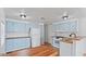 An open kitchen with light blue cabinets, wood countertops, and matching modern appliances at 2121 N Center St # 198, Mesa, AZ 85201
