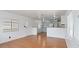 Open living space featuring wood floors, a large window, and neutral-toned walls at 2121 N Center St # 198, Mesa, AZ 85201