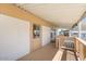 The covered patio features wood railings, awning and a matching exterior at 2121 N Center St # 198, Mesa, AZ 85201