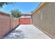 Long driveway with gates leading to the home at 22121 N Greenland Park Dr, Maricopa, AZ 85139