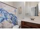 Cozy bathroom featuring a turtle shower curtain at 24348 S 201St Ct, Queen Creek, AZ 85142