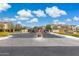 The community entrance is gated with landscaping and decorative stonework on either side at 2741 S Gordon --, Mesa, AZ 85209