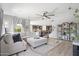 Inviting open-concept living room with an elegant sectional sofa, and open access to the kitchen at 2741 S Gordon --, Mesa, AZ 85209