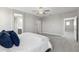 The light and airy main bedroom includes a ceiling fan, ensuite, and neutral colors, creating a relaxing retreat at 2741 S Gordon --, Mesa, AZ 85209