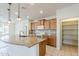 Kitchen featuring granite countertops, stainless appliances, pantry and lots of storage at 27413 W Tonopah Dr, Buckeye, AZ 85396