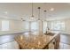 Open layout with spacious island, great for entertaining at 27413 W Tonopah Dr, Buckeye, AZ 85396