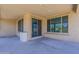 Covered patio with sliding glass doors and a storage unit, perfect for outdoor entertaining at 27413 W Tonopah Dr, Buckeye, AZ 85396