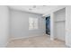 Neutral bedroom with a window, closet, and unique cosmic accent wall at 31653 N 24Th Dr, Phoenix, AZ 85085