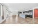 Open-concept living space featuring a large island, tile floors, and lots of natural light at 31653 N 24Th Dr, Phoenix, AZ 85085