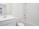 Bright bathroom features a tub-shower combination and a modern single sink vanity at 32218 N Knauss Ln, San Tan Valley, AZ 85143