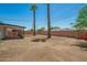 The home has desert landscaping in the backyard at 3302 N 40Th Dr, Phoenix, AZ 85019